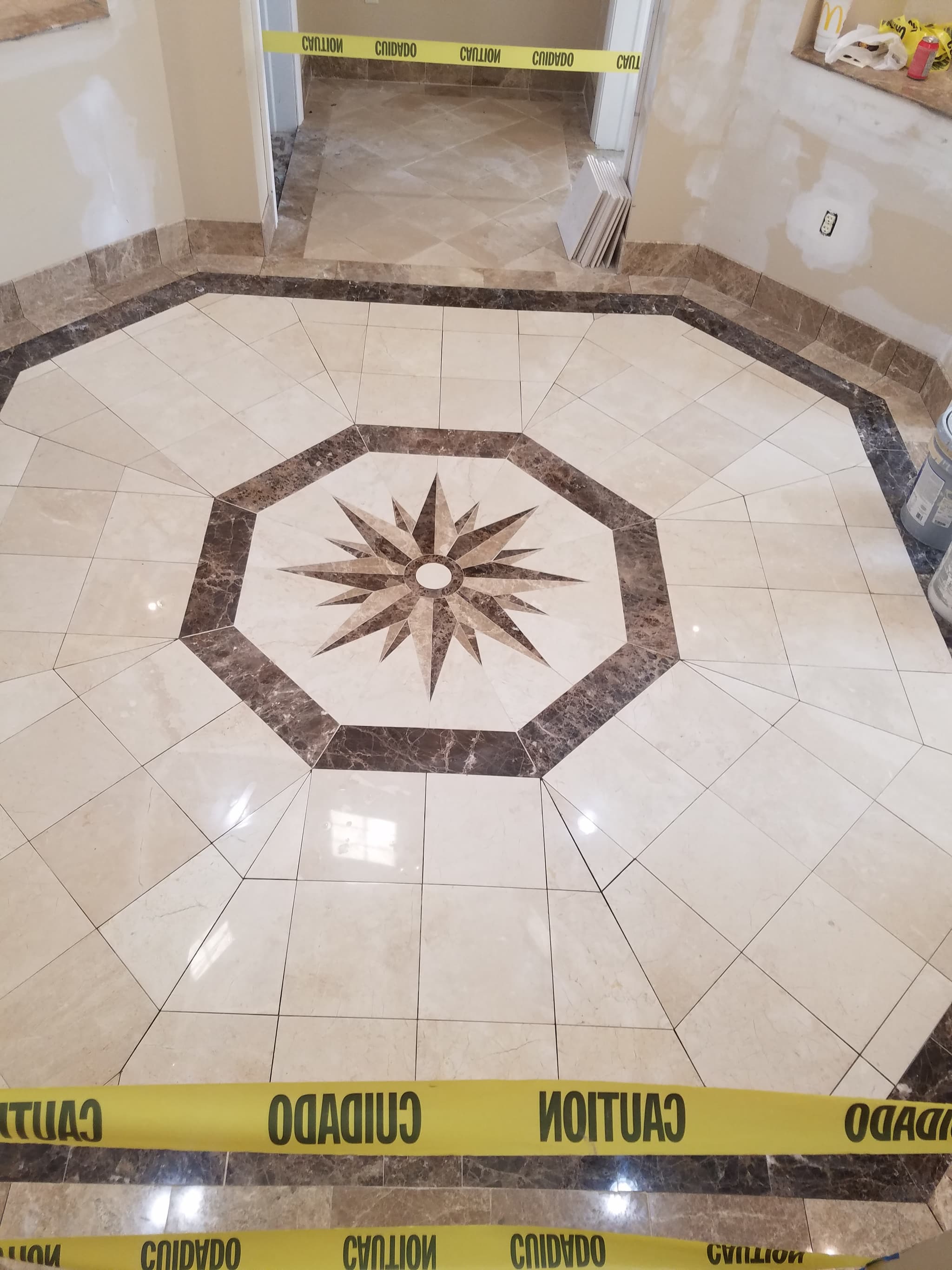 Finished marble medallion floor installation
