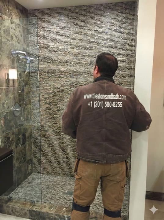 Vibrant blue glass mosaic tiles creating underwater pattern